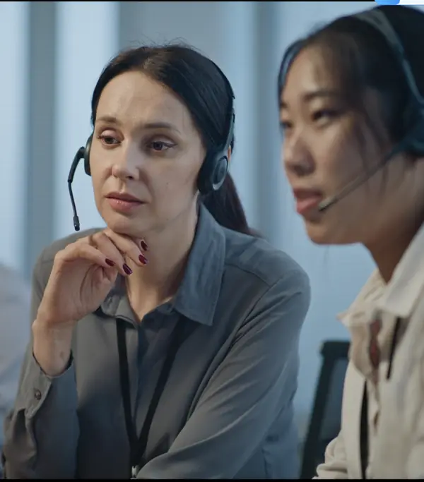Remote support agents wearing headsets